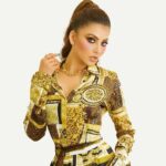 Urvashi Rautela looks fierce and beautiful wearing the iconic Versace baroque print dress